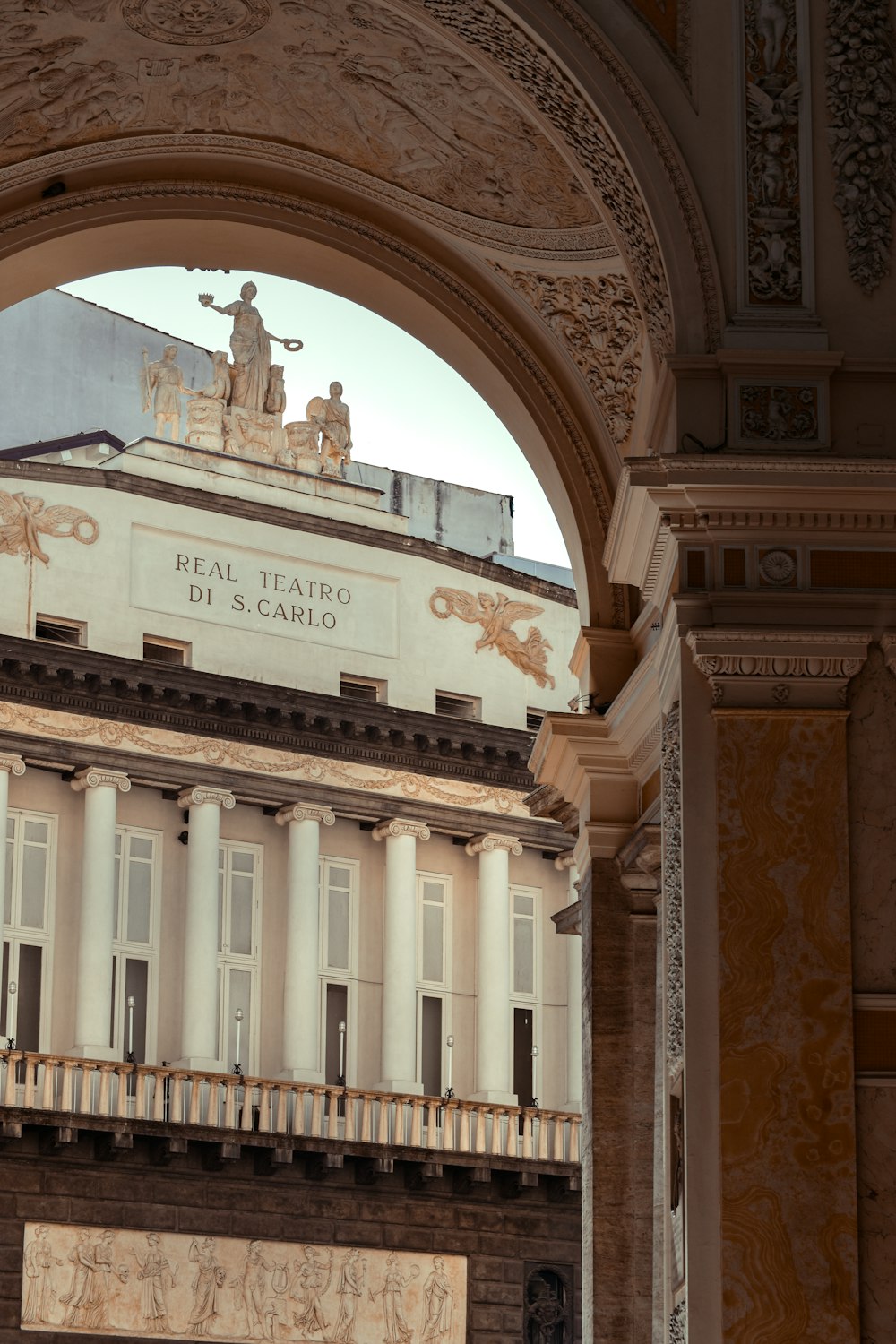 a building with a statue on top of it