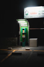 Animated neon green checkmark confirming payment release after parking spot handover.