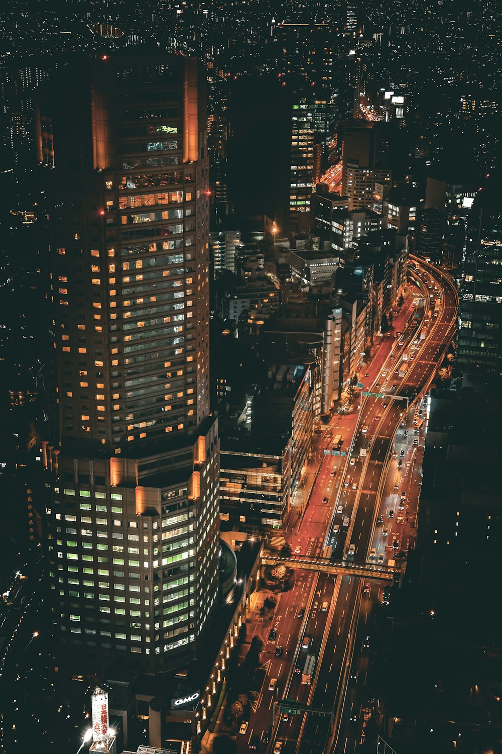 an aerial view of a city at night