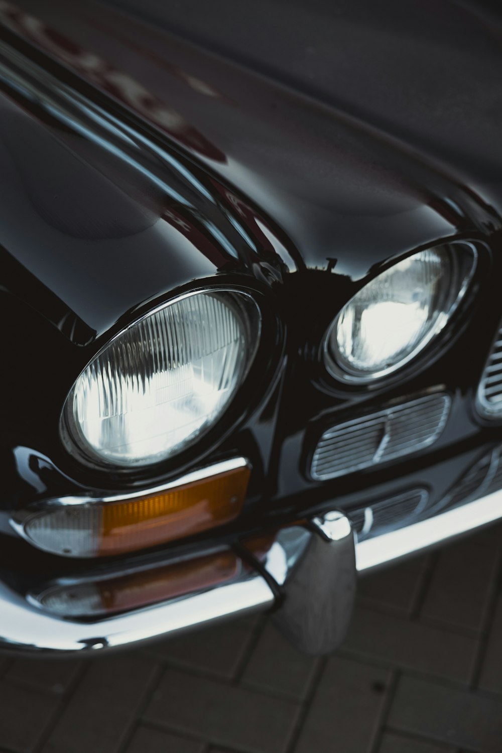 a close up of a car headlight on a car