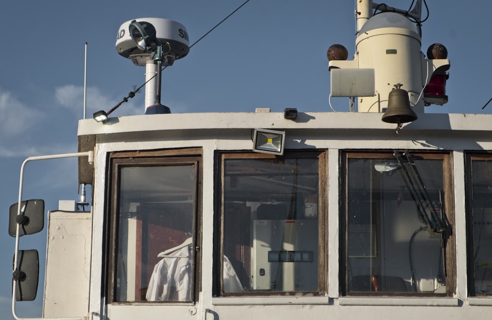 a view of the top of a boat with a lot of windows