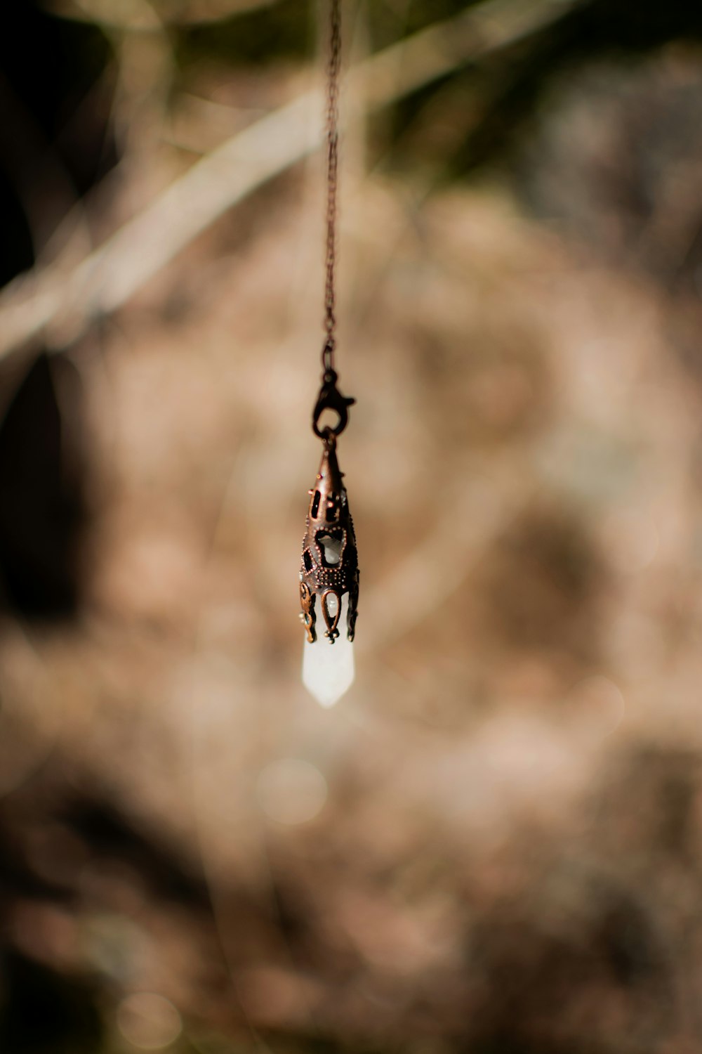 a close up of a small hanging object