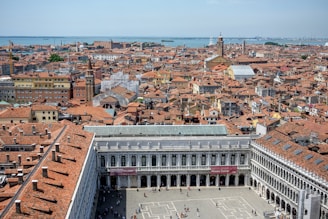 an aerial view of a city with many buildings