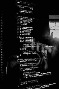 Behind-the-scenes photo of a developer coding late into the night.
