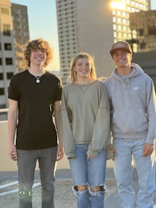 a group of young people standing next to each other