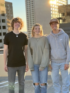a group of young people standing next to each other