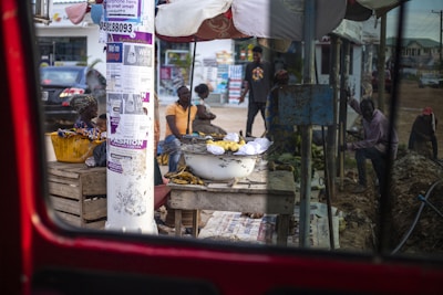 A lively street scene in an African city showcasing daily life and community.