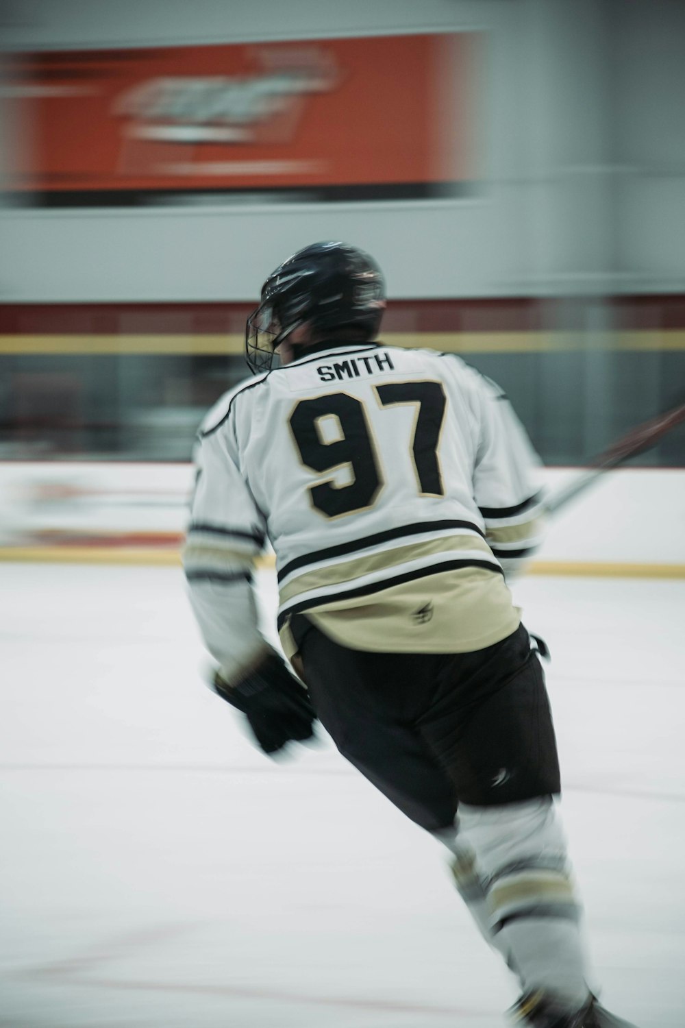 a hockey player is moving on the ice