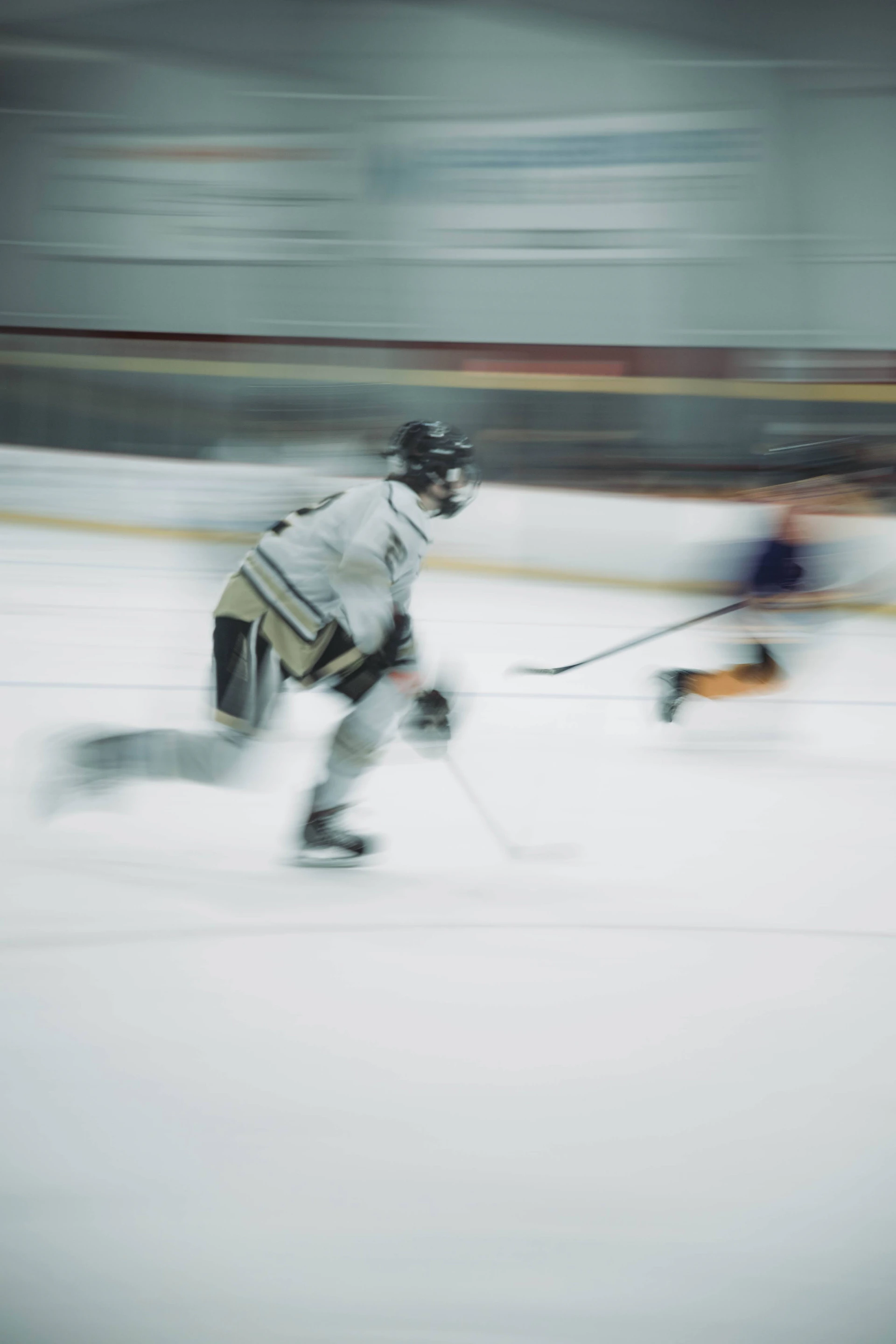 A dynamic action shot from a sports event, freezing the intensity and excitement of players mid-game under bright stadium lights.
