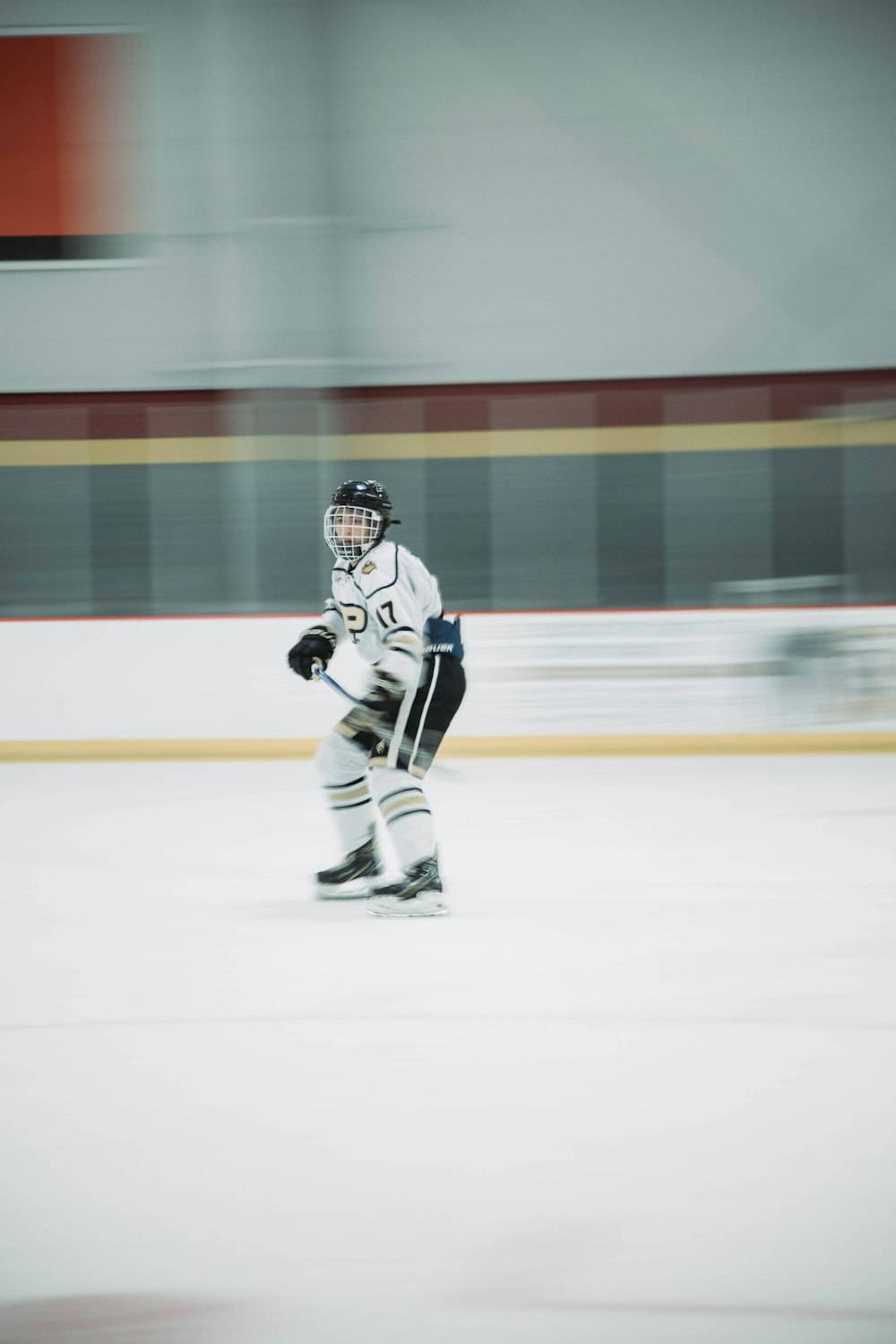 a hockey player is skating on the ice