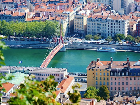 A view of a bridge over a river in a city — Lyon, France
