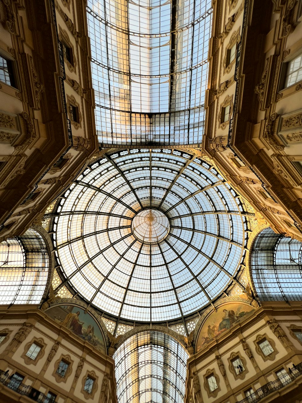 the ceiling of a building with a glass dome