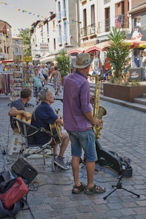 A vibrant urban scene featuring musicians performing on a city street.