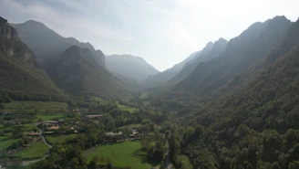 Peaceful valley landscape with mountains and early morning light near Hotel Vardaan Hills.