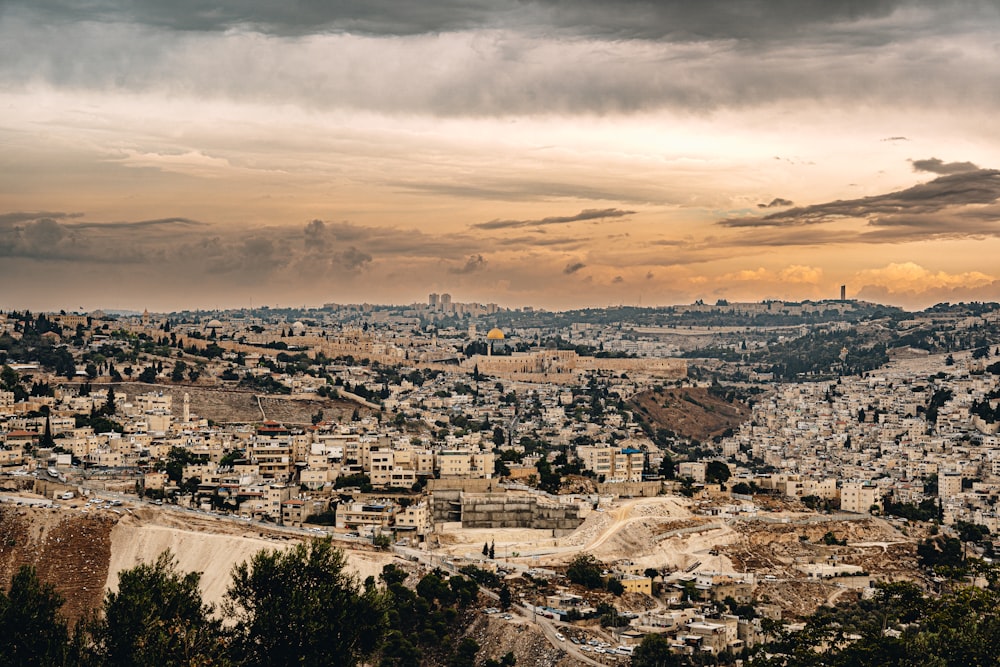 a view of a city from a hill