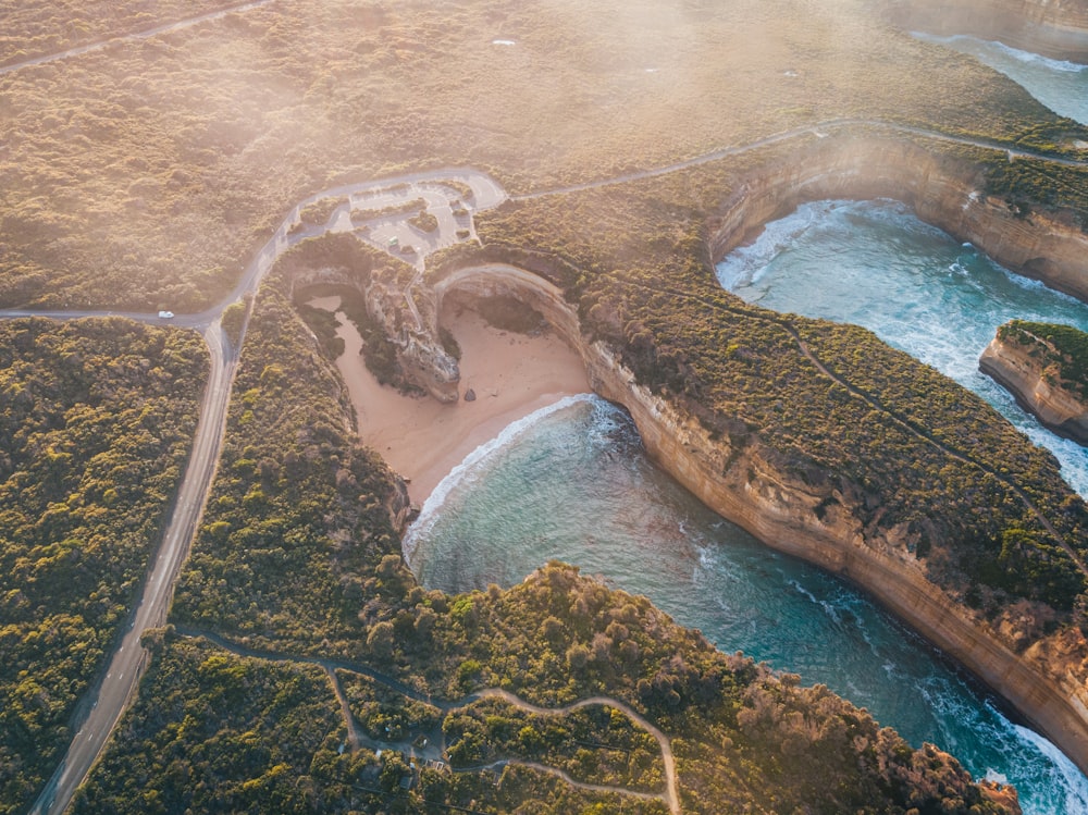 a bird's eye view of a river and a beach