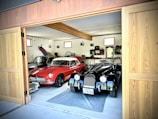 A spacious garage interior featuring an open garage door.