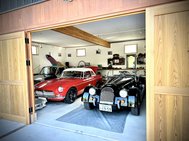 A spacious garage interior featuring sturdy wooden framing and clean carpentry lines.