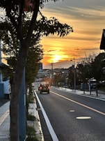 Sunset view over Chambéry with a vehicle removal truck driving away.