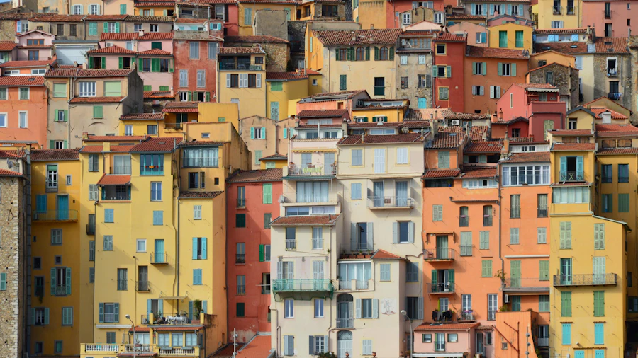 Pastel houses along the water in Menton