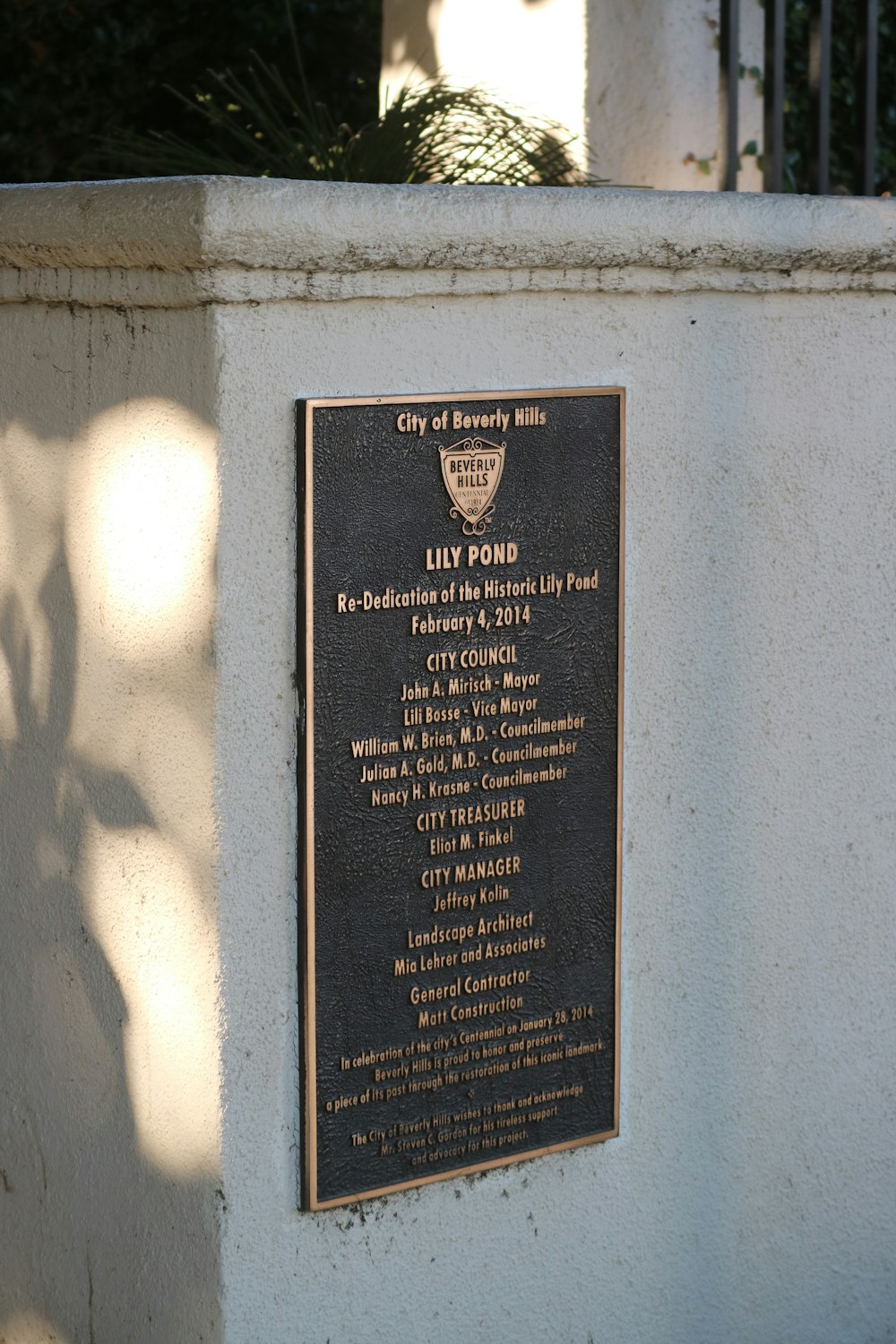 a plaque on the side of a building