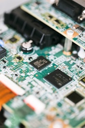 a close up of a motherboard with many wires
