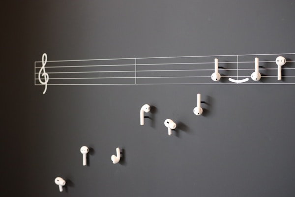 Digital artwork representing personalized music creation with headphones and notes