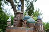 Close-up of a detailed 3D printed miniature castle in vibrant colors.