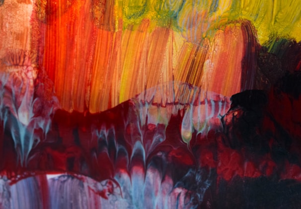 A vibrant custom floral painting bursting with warm reds and oranges.