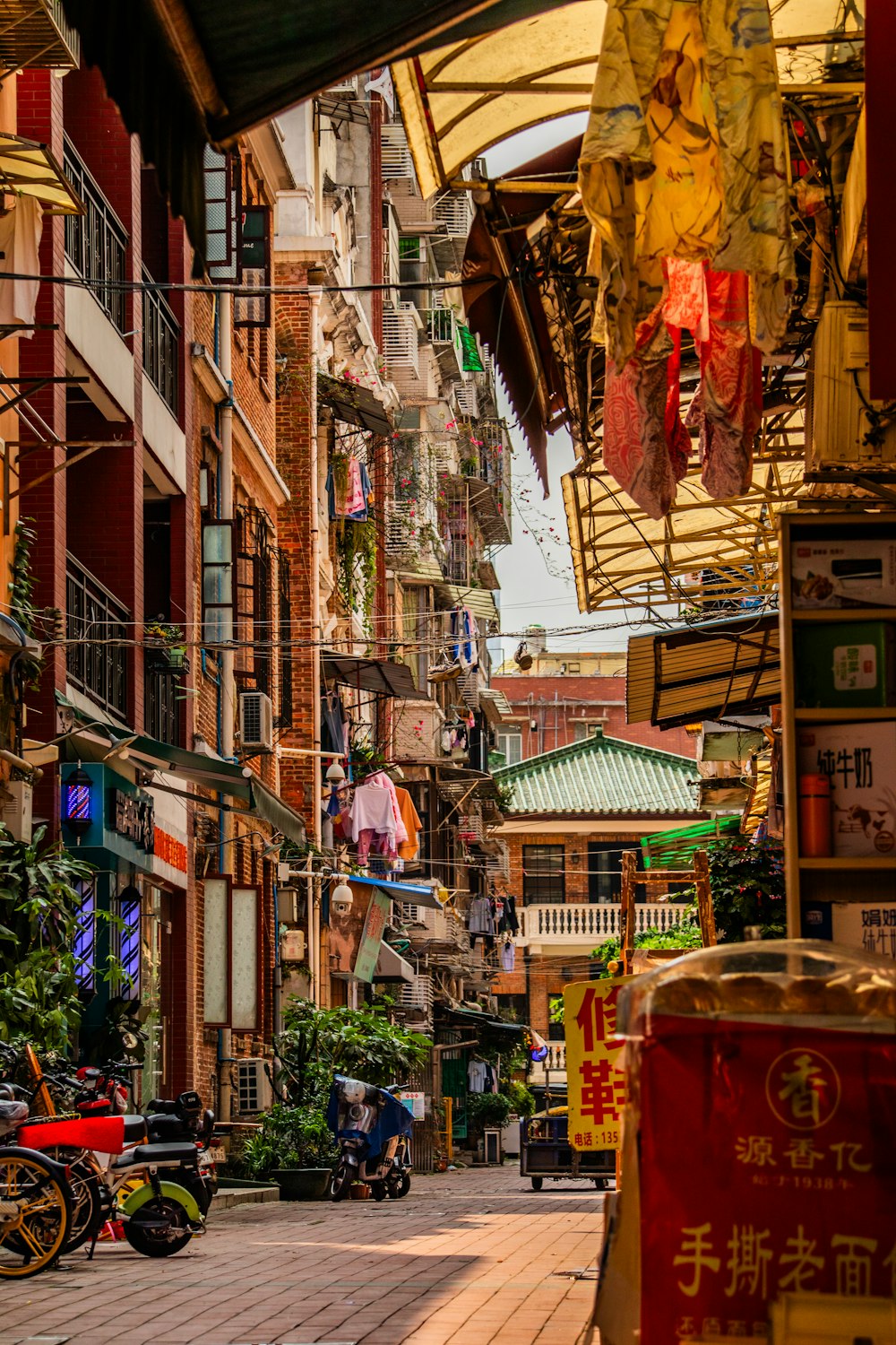 a city street lined with lots of tall buildings