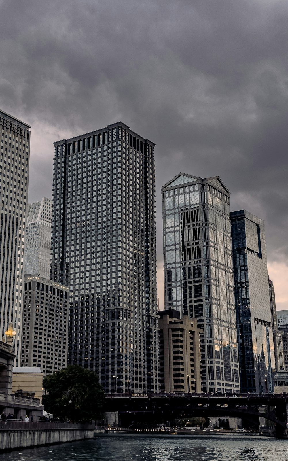 a large body of water surrounded by tall buildings