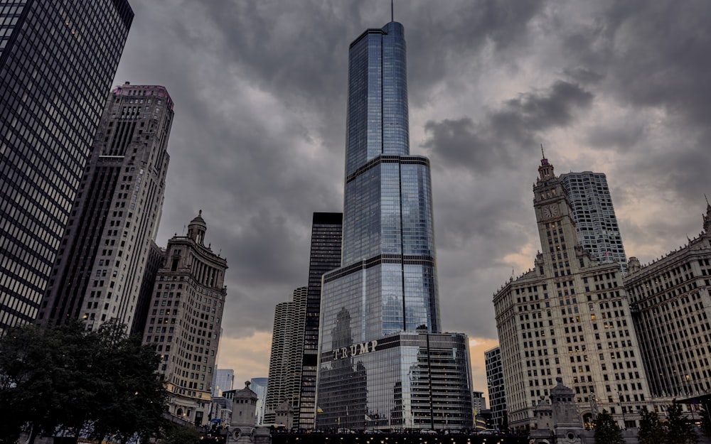 a very tall building towering over a city