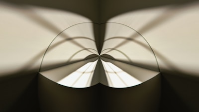 An abstract architectural detail showing patterns of light and shadow.