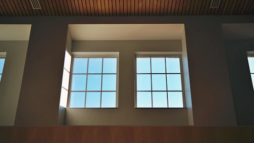 Bright room featuring aluminum window frames and glass panels.