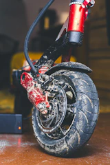 a close up of a red and black motorcycle tire