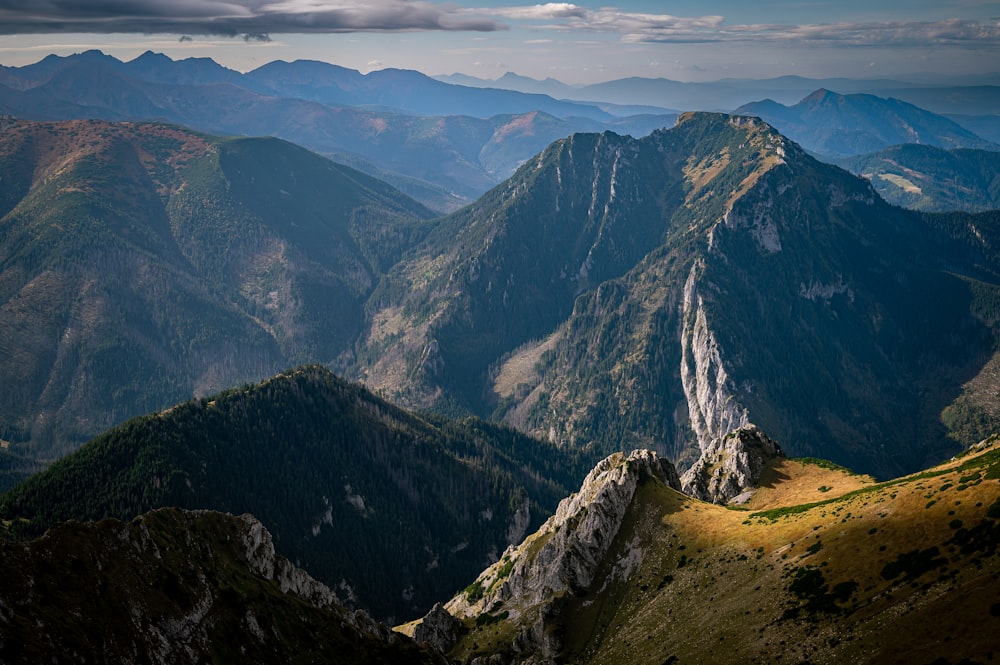 a view of a mountain range from the top of a mountain