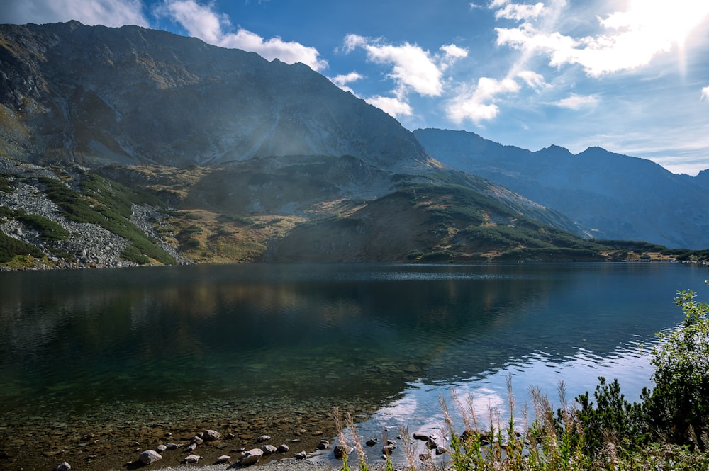 a large body of water surrounded by mountains