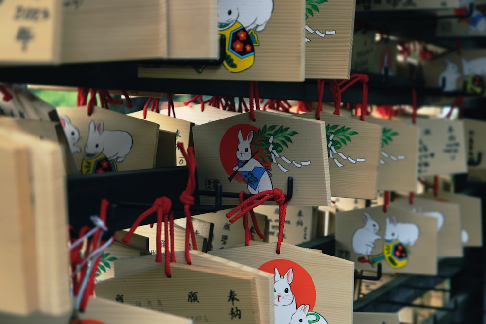a bunch of wooden boxes with cartoon characters on them