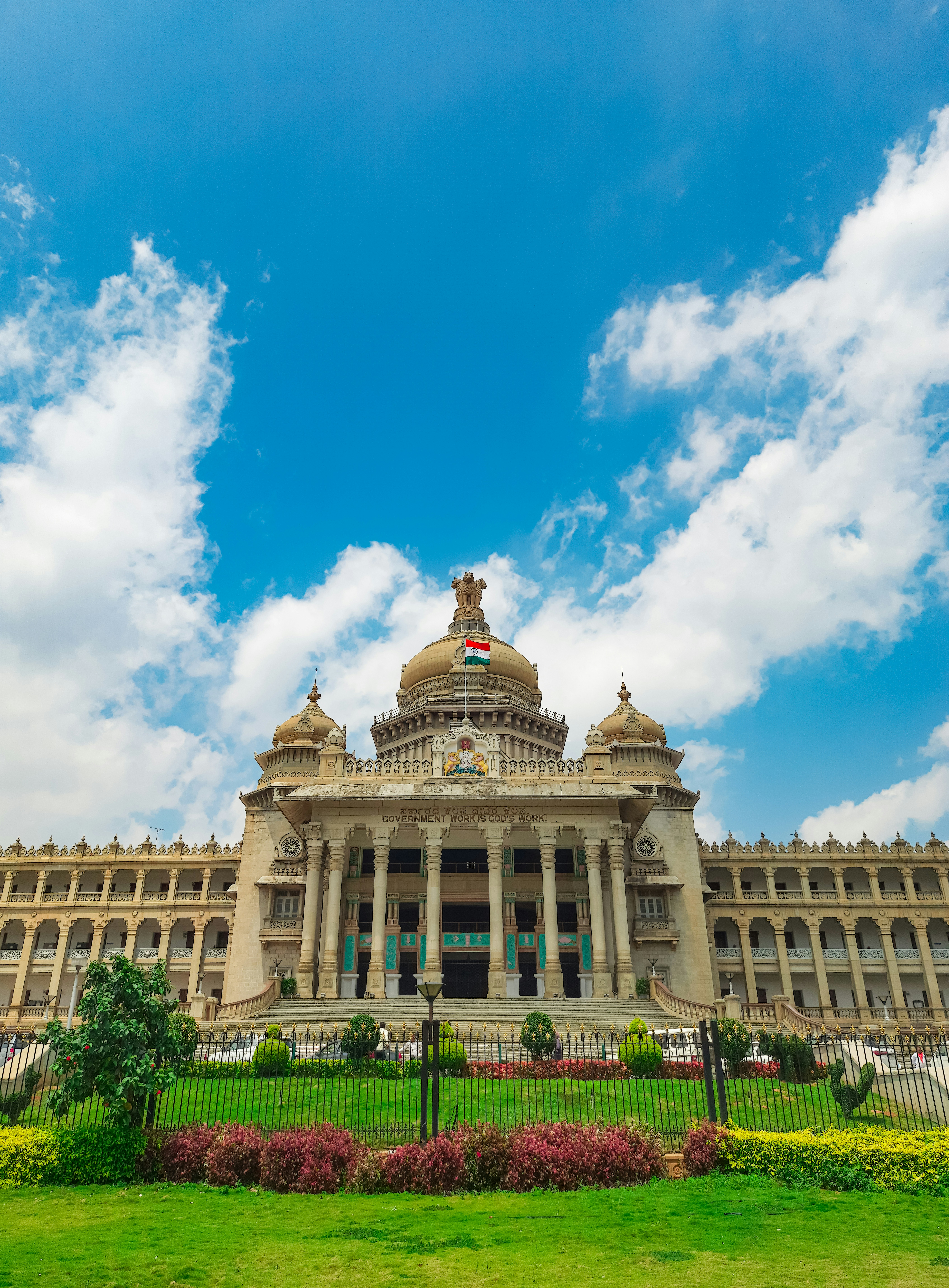 Government building with Indian flag representing policy and regulatory environment