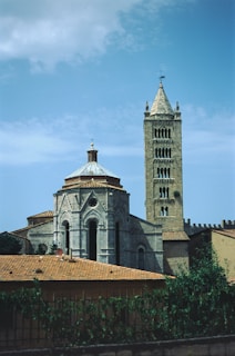 a tall tower with a clock on top of it