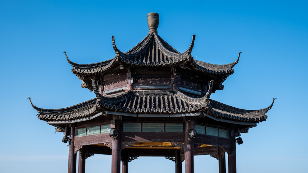 a tall tower with a sky in the background