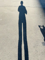 Engineers conducting a detailed shadow analysis during a site survey at sunrise.