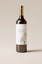 a bottle of wine sitting on top of a table