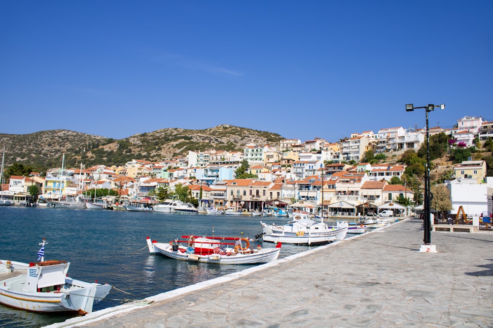 a group of boats that are sitting in the water