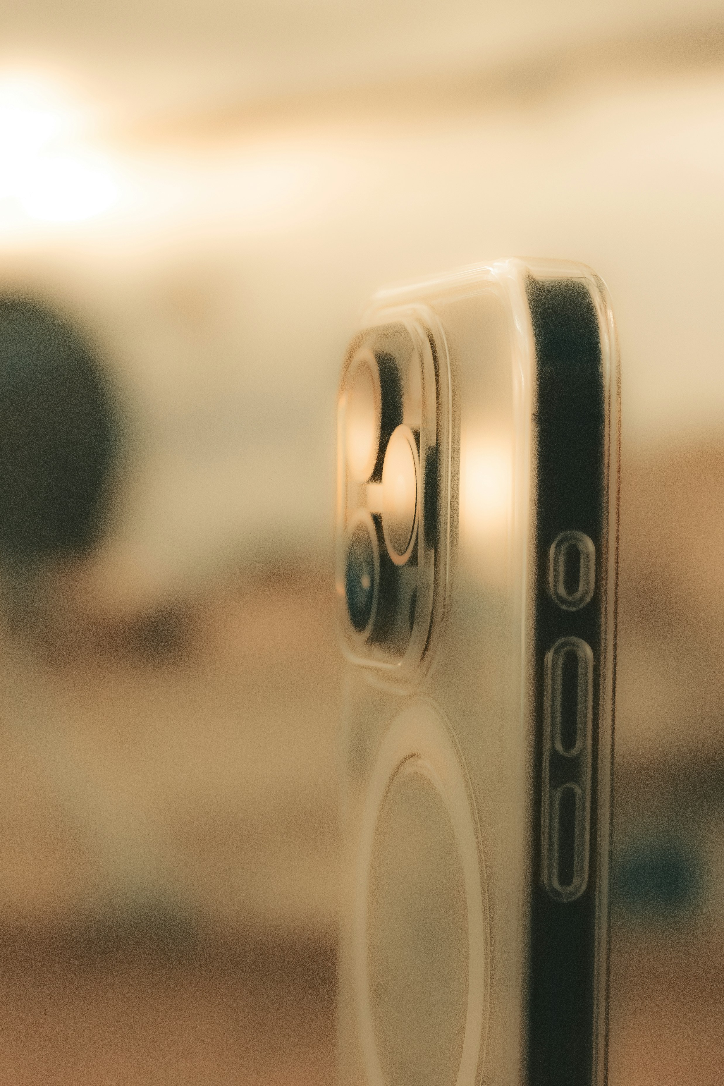 a close up of a cell phone with a blurry background