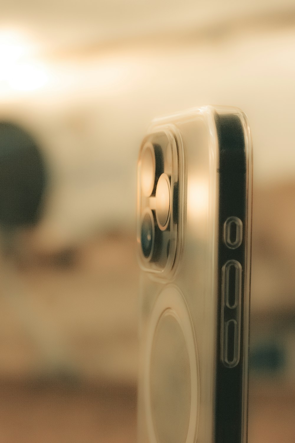 a close up of a cell phone with a blurry background