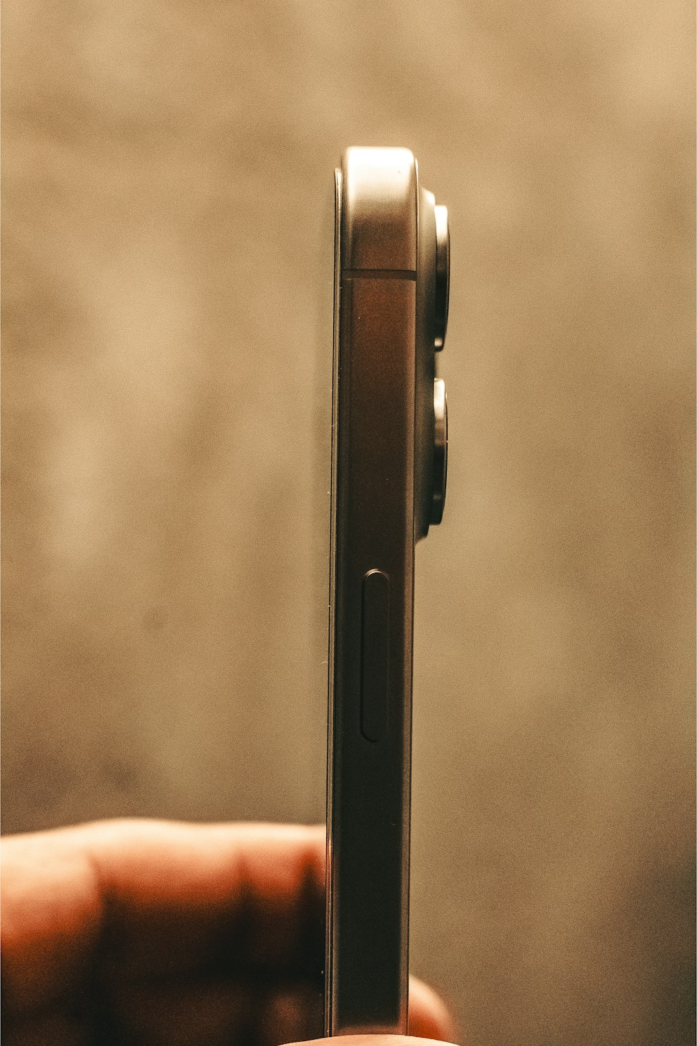 a close up of a person holding a cell phone