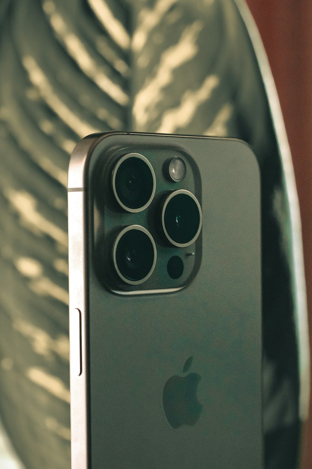 a close up of a cell phone on a table