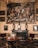 A richly decorated room featuring a large classical painting on the wall, depicting mythological figures in a pastoral scene. The room is furnished with elegant antique chairs and has a fireplace adorned with decorative vases and a small mirror. A display case on a table showcases an ornate garment or tapestry, possibly of historical significance.