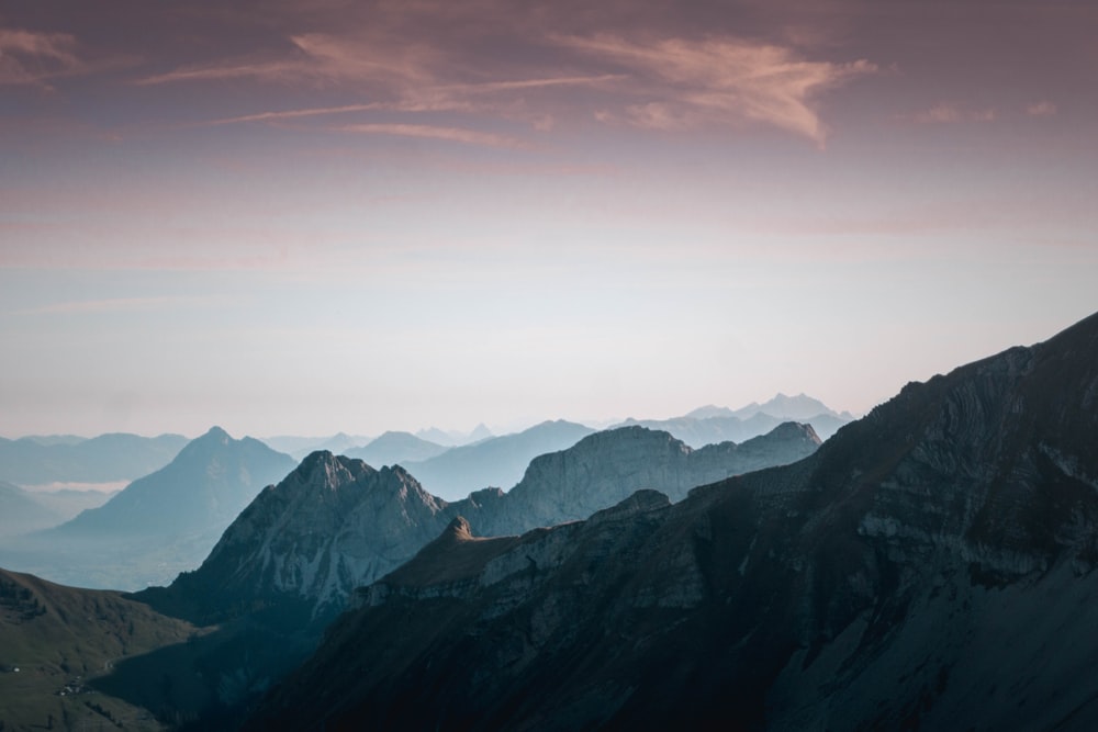 a mountain range with mountains in the distance